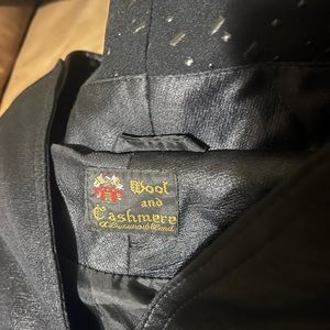Cashmere trench coat, don’t know anything about it, if you do maybe it’s a steal